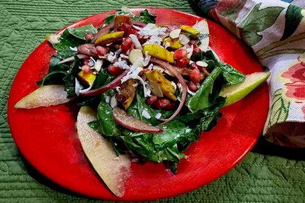 Kale and Roasted Delicata Squash Salad with Pomegranate Vinaigrette